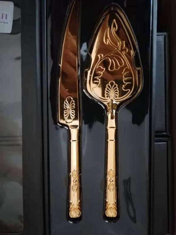 Ensemble cuillère et couteau royal
